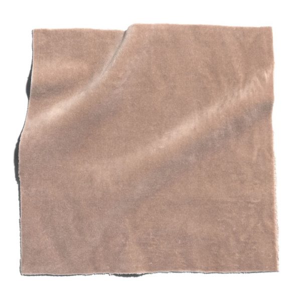 Beige cloth on white surface, top fabric online in Mumbai