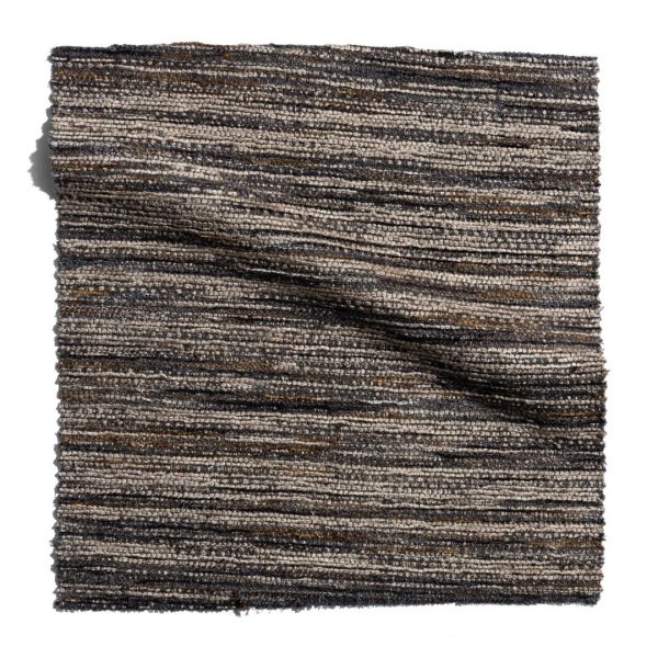 A black and gray striped rug on a white background, available for purchase online in Mumbai, from Pure Concept Home