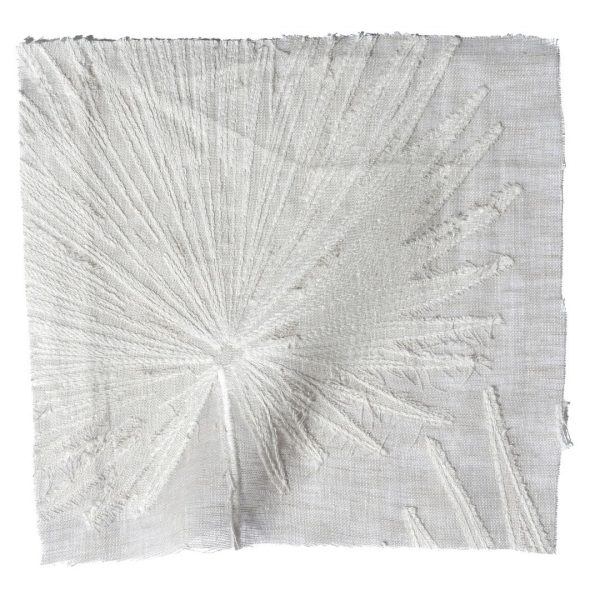 White linen napkin with a large white flower - elegant and delicate home decor accessory