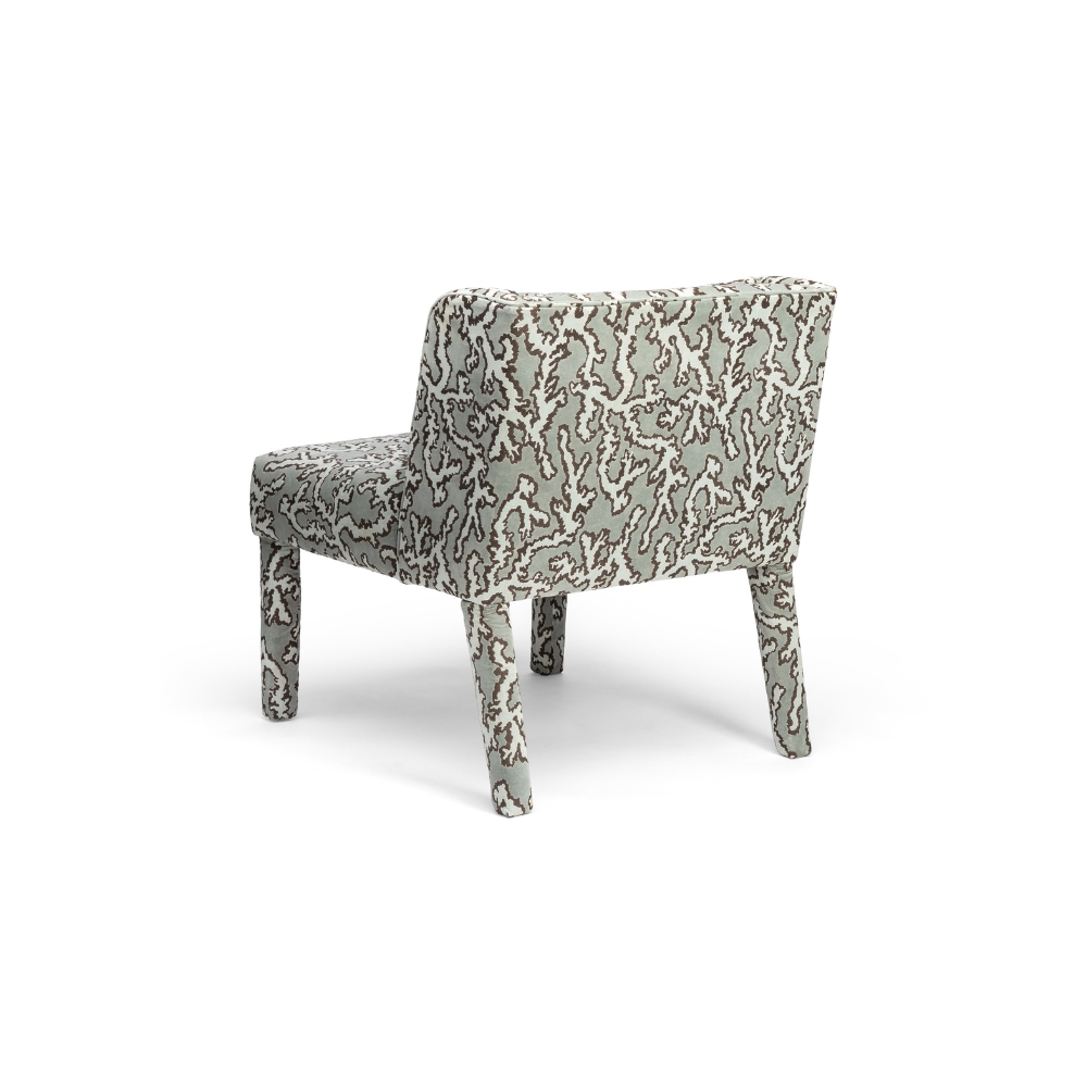 Close-up of Magnus chair's digital print geometric linen fabric