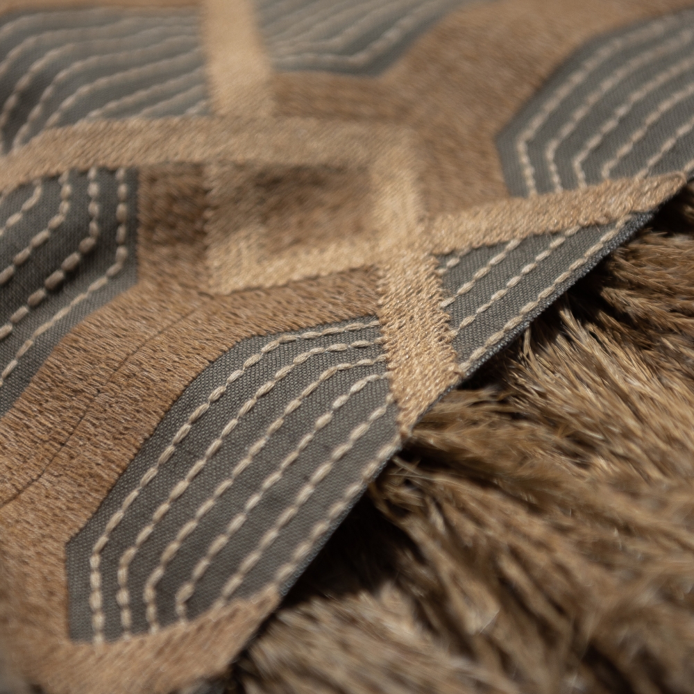 Geometric YOKO textile with organic fern motifs